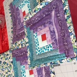 Homemade vibrant hot pads. One 11"x11". One 22"x11". Never used.